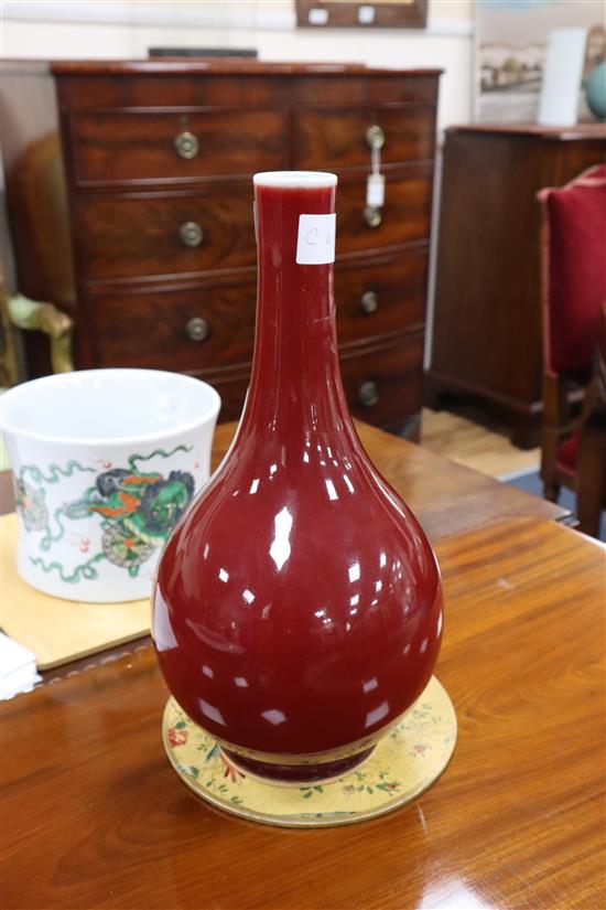 A Chinese sang de boeuf bottle vase, Kangxi mark, height 35.5cm